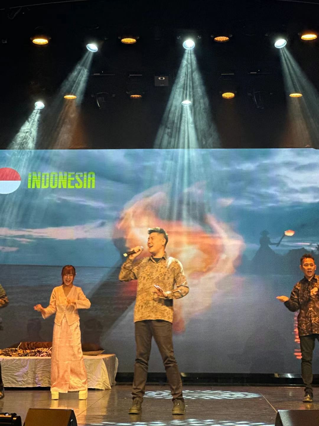 Bryan.T singing on stage
